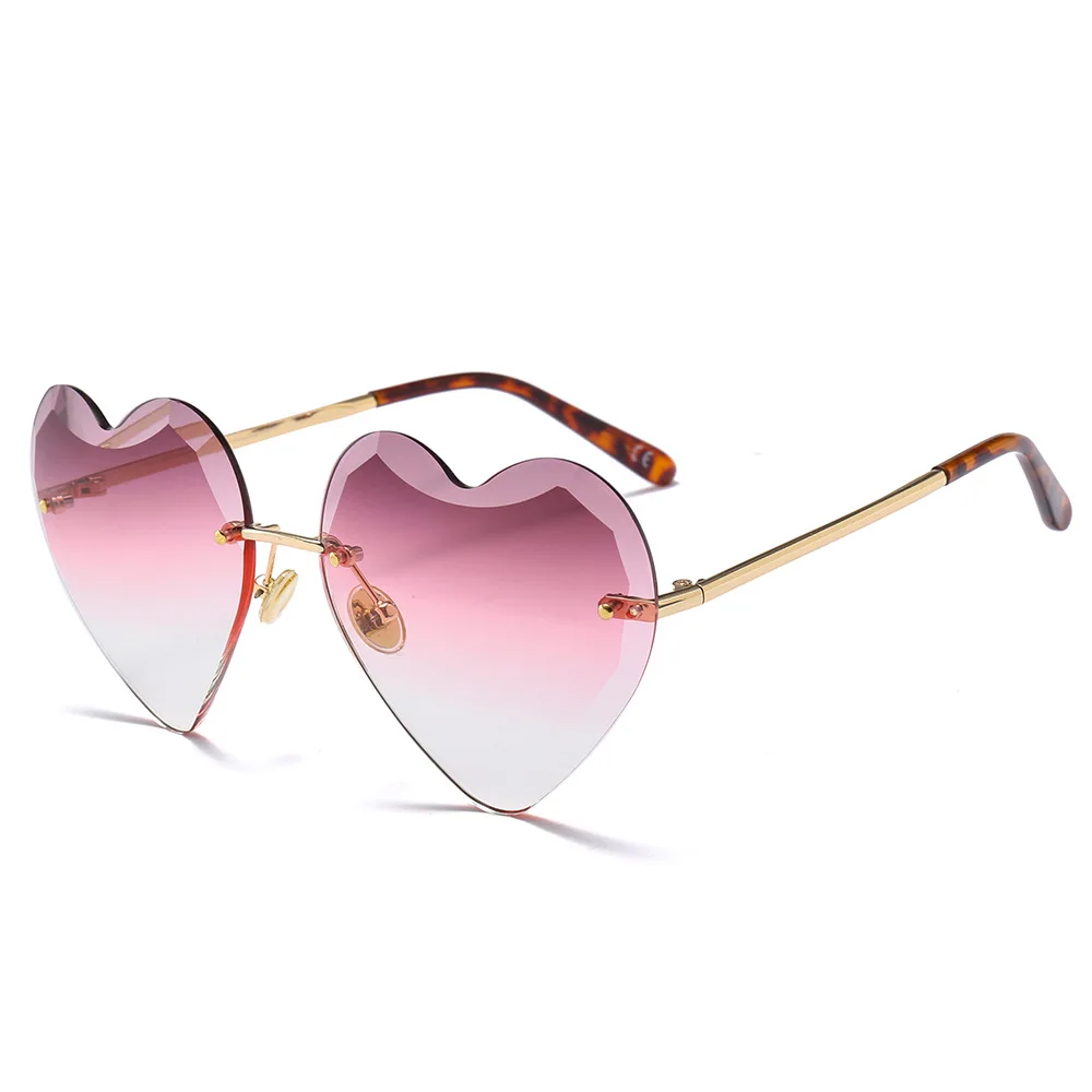 Новые солнцезащитные очки с сердечками для женщин модные без оправы милые