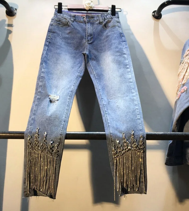 Chic Beads Tassel Diamond Ripped Jeans for Women High Waisted Denim Pants Stretchy Slim Fit Cropped Trousers 2021 Spring Tide
Chic Beads Tassel Diamond Ripped Jeans for Women High Waisted Denim Pants Stretchy Slim Fit Cropped Trousers 2021 Spring Tide
