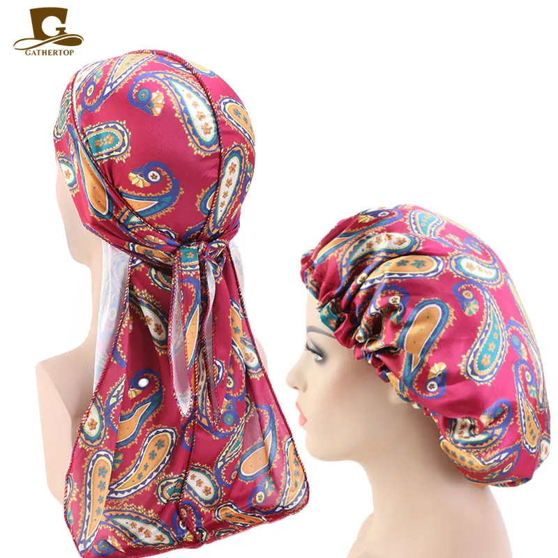 Custom designer print silky satin durag Match Silk Bonnet for Women silky Bandanas for Men Long Tail Durags Wave Cap Sleep Cap
Custom designer print silky satin durag Match Silk Bonnet for Women silky Bandanas for Men Long Tail Durags Wave Cap Sleep Cap