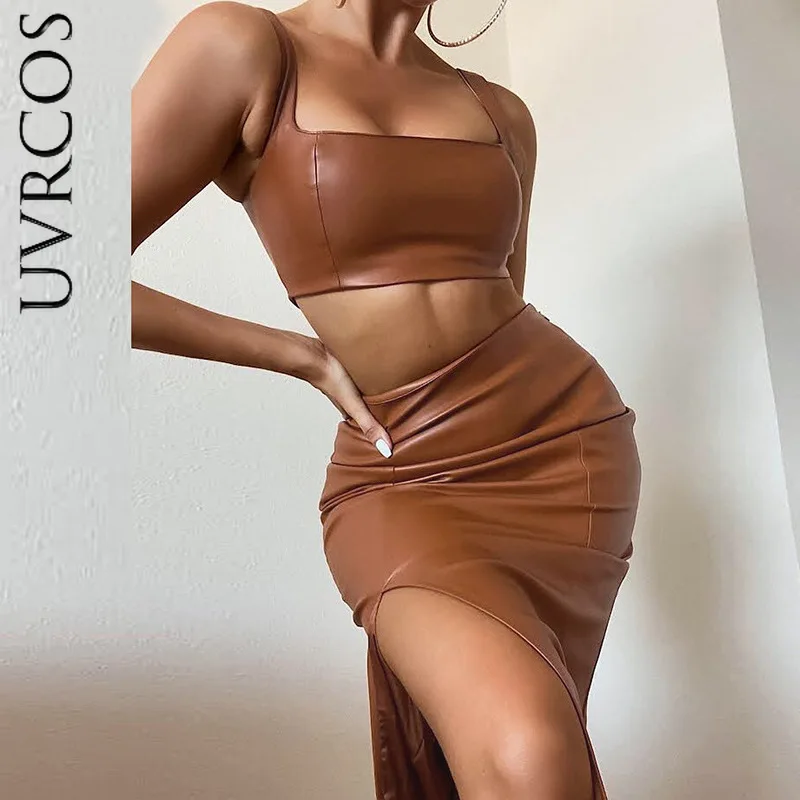 Women's Fashion Solid Backless Suspenders Pu Short Vest Slim Slit Split Skirt Two Piece Suit Women Autumn 2021 New Streetwear
Women's Fashion Solid Backless Suspenders Pu Short Vest Slim Slit Split Skirt Two Piece Suit Women Autumn 2021 New Streetwear