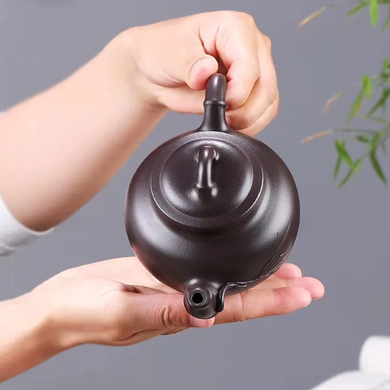 New handmade bamboo pot full handmade Yixing famous bamboo Primula purple clay teapot
New handmade bamboo pot full handmade Yixing famous bamboo Primula purple clay teapot