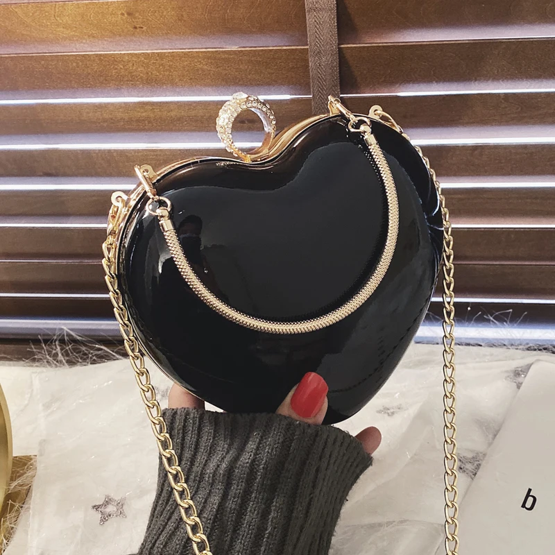 Cute Ladies Metal Ring Tote Bag 2020 Fashion New Quality Patent Leather Women's Designer Handbag Chain Shoulder Messenger Bag
Cute Ladies Metal Ring Tote Bag 2020 Fashion New Quality Patent Leather Women's Designer Handbag Chain Shoulder Messenger Bag