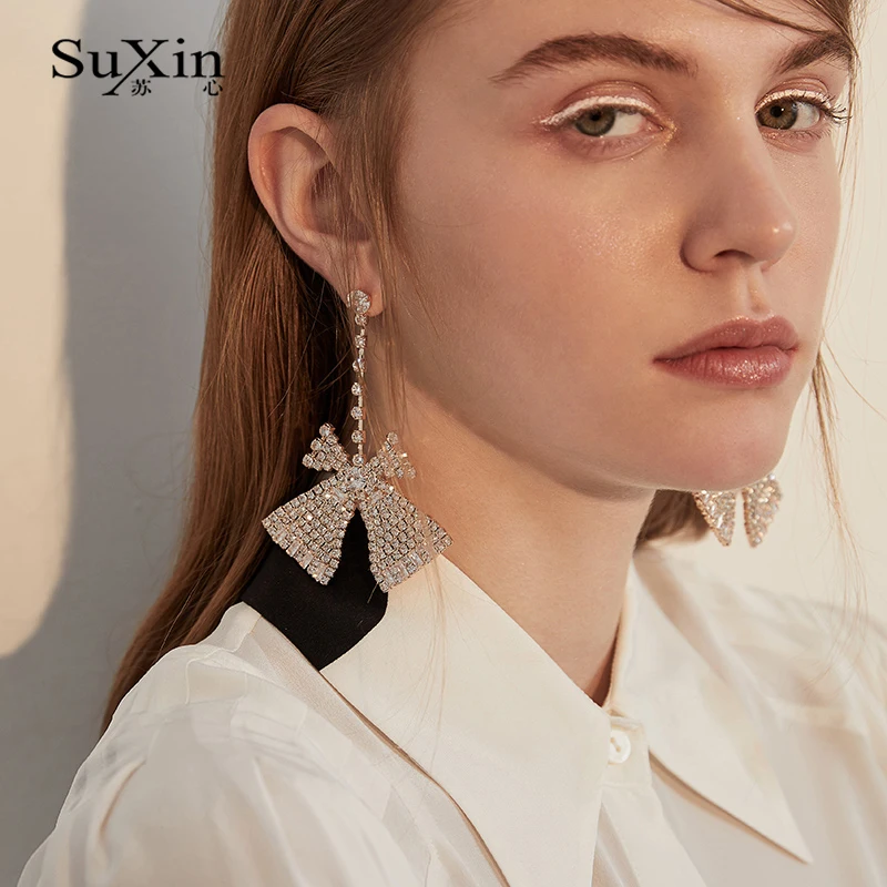 SuXin earrings 2020 new simple temperament bow earrings for women long crystal pendant earrings jewelry gift
SuXin earrings 2020 new simple temperament bow earrings for women long crystal pendant earrings jewelry gift