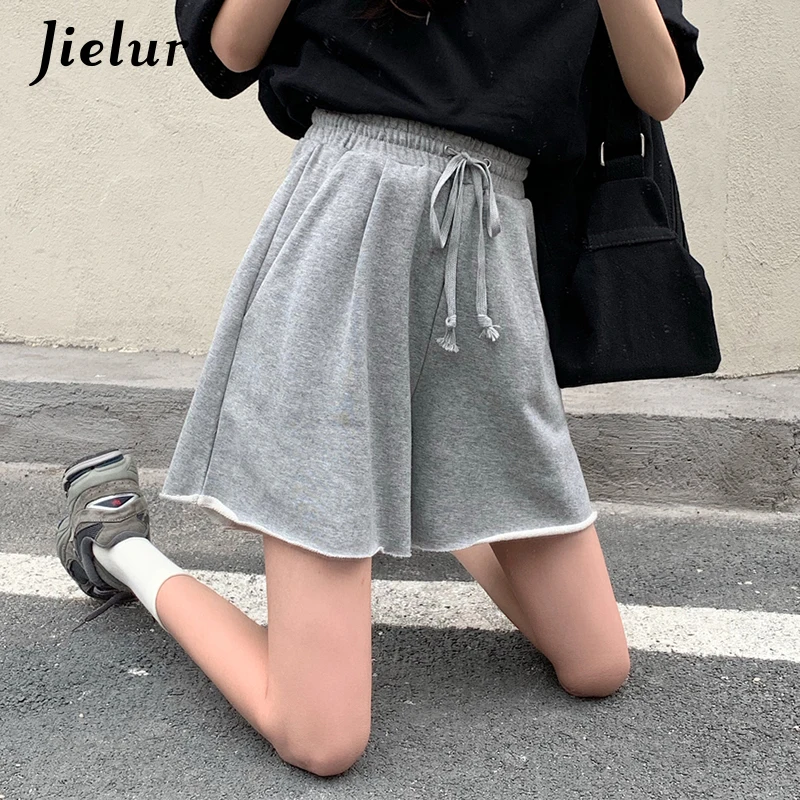 Спортивные женские шорты Jielur Kpop, летние свободные шорты с завязками, серые, черные, с высокой талией, для отдыха, для молодых, а-силуэта, лидер продаж
Спортивные женские шорты Jielur Kpop, летние свободные шорты с завязками, серые, черные, с высокой талией, для отдыха, для молодых, а-силуэта, лидер продаж