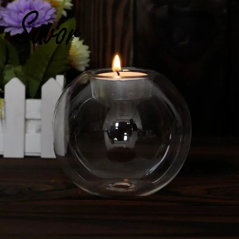 Europe style round hollow glass candle holder wedding candlestick fine transparent crystal glass candlestick dining home decor 
Europe style round hollow glass candle holder wedding candlestick fine transparent crystal glass candlestick dining home decor