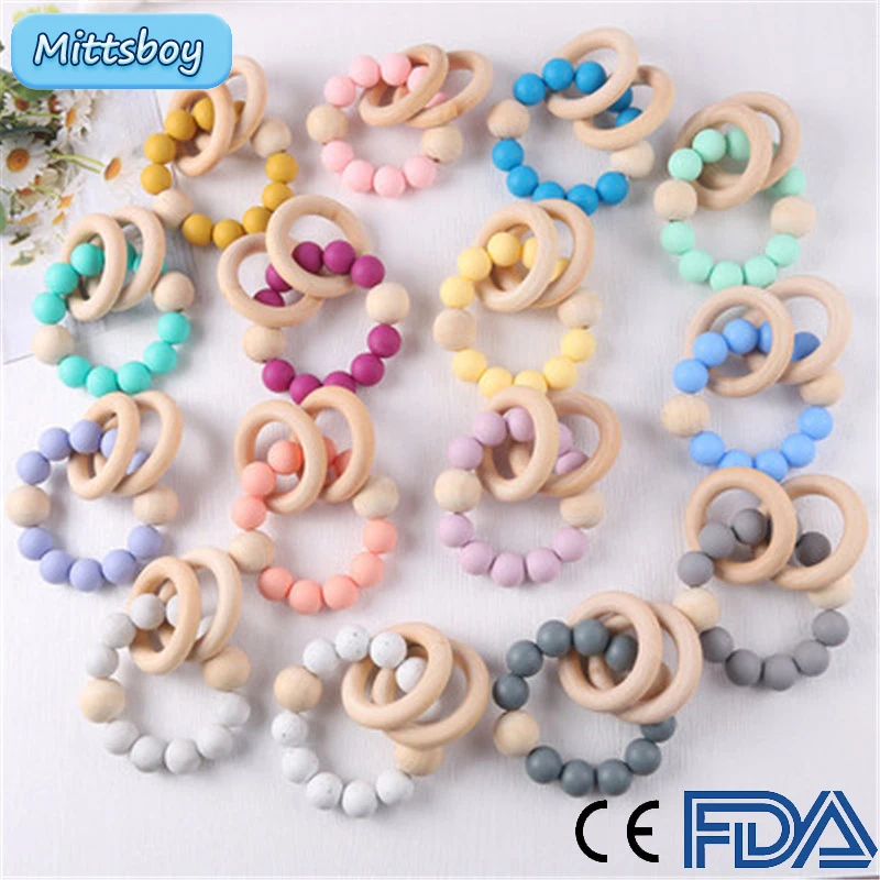 Baby Teethers Pink Silica Gel Two Wood Ring Holder Chain Teething Stick Chews Silicone Beads Pacifier Clip Pacifier Chain Holder
Baby Teethers Pink Silica Gel Two Wood Ring Holder Chain Teething Stick Chews Silicone Beads Pacifier Clip Pacifier Chain Holder