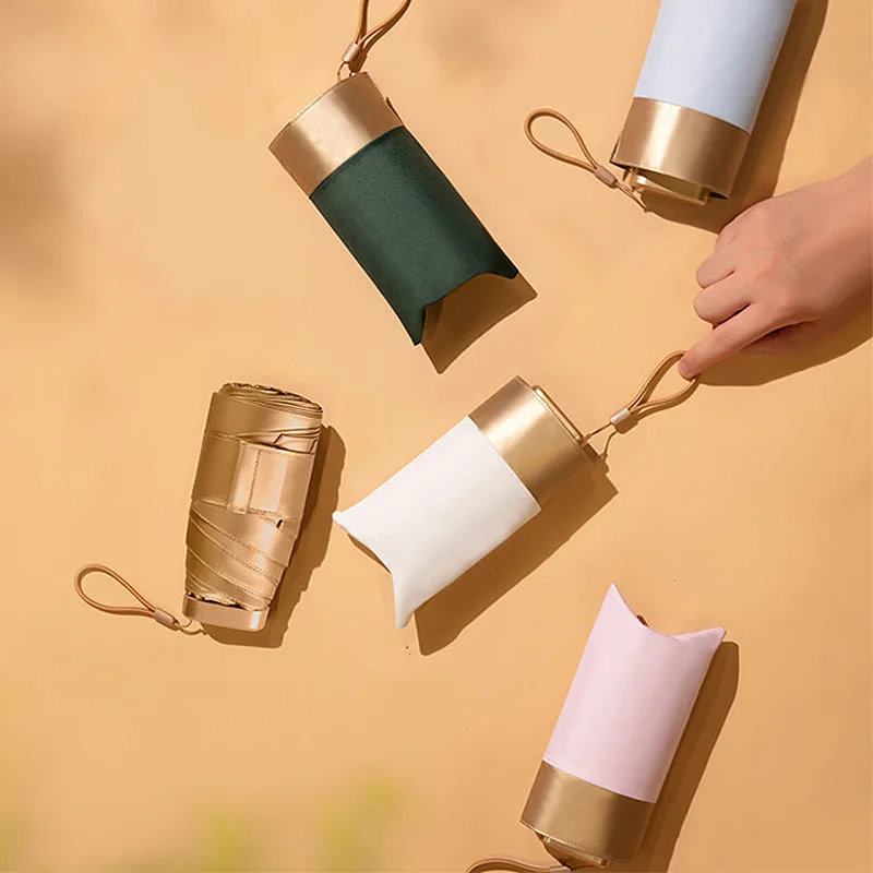 Small gold umbrella 14cm palm super sunscreen uv protection small thumb umbrella half fold sun umbrella sun umbrella female
Small gold umbrella 14cm palm super sunscreen uv protection small thumb umbrella half fold sun umbrella sun umbrella female