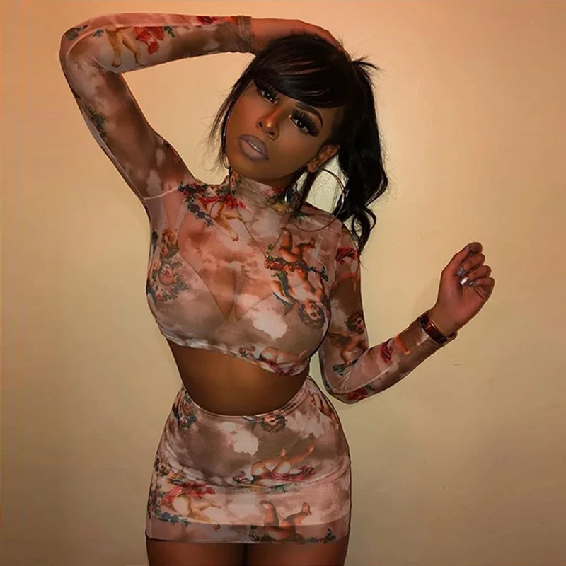 Sexy See Through Print Mesh Sets 2Pieces Women Outfits Long Sleeve Skinny Crop Tops+Mini Bodycon Skirts Female Clubwear
Sexy See Through Print Mesh Sets 2Pieces Women Outfits Long Sleeve Skinny Crop Tops+Mini Bodycon Skirts Female Clubwear
