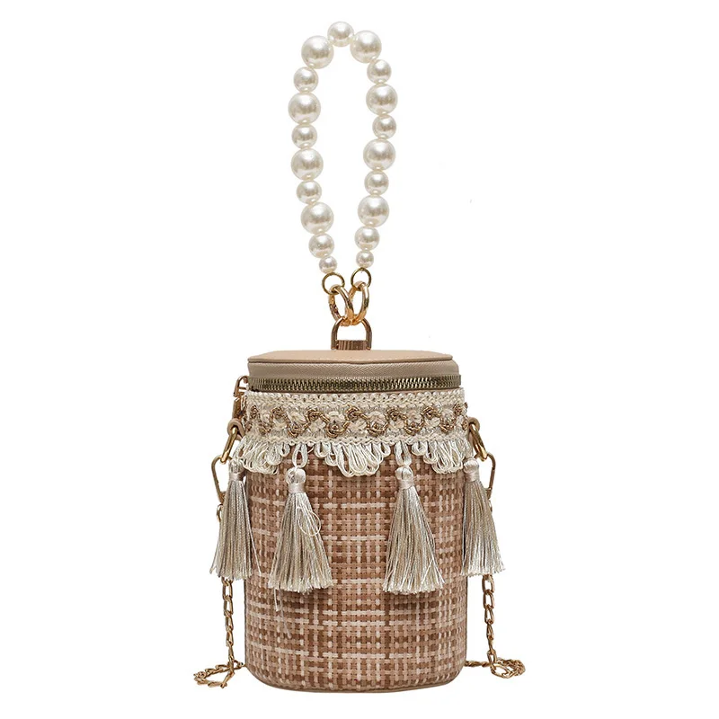 Bag women's small fragrance women's bag 2021 national style pearl portable tassel lady's cross cylinder bag
Bag women's small fragrance women's bag 2021 national style pearl portable tassel lady's cross cylinder bag