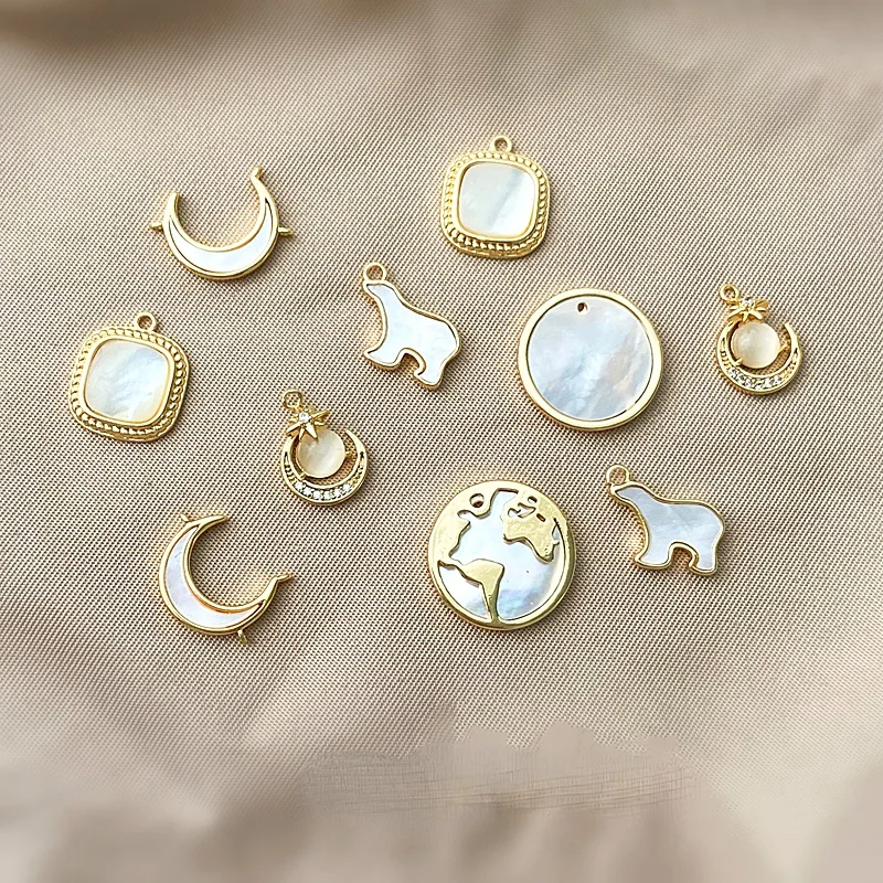 Light luxury shell inlaid gold-plated jewelry material polar bear map moon pendant diy earrings necklace
Light luxury shell inlaid gold-plated jewelry material polar bear map moon pendant diy earrings necklace