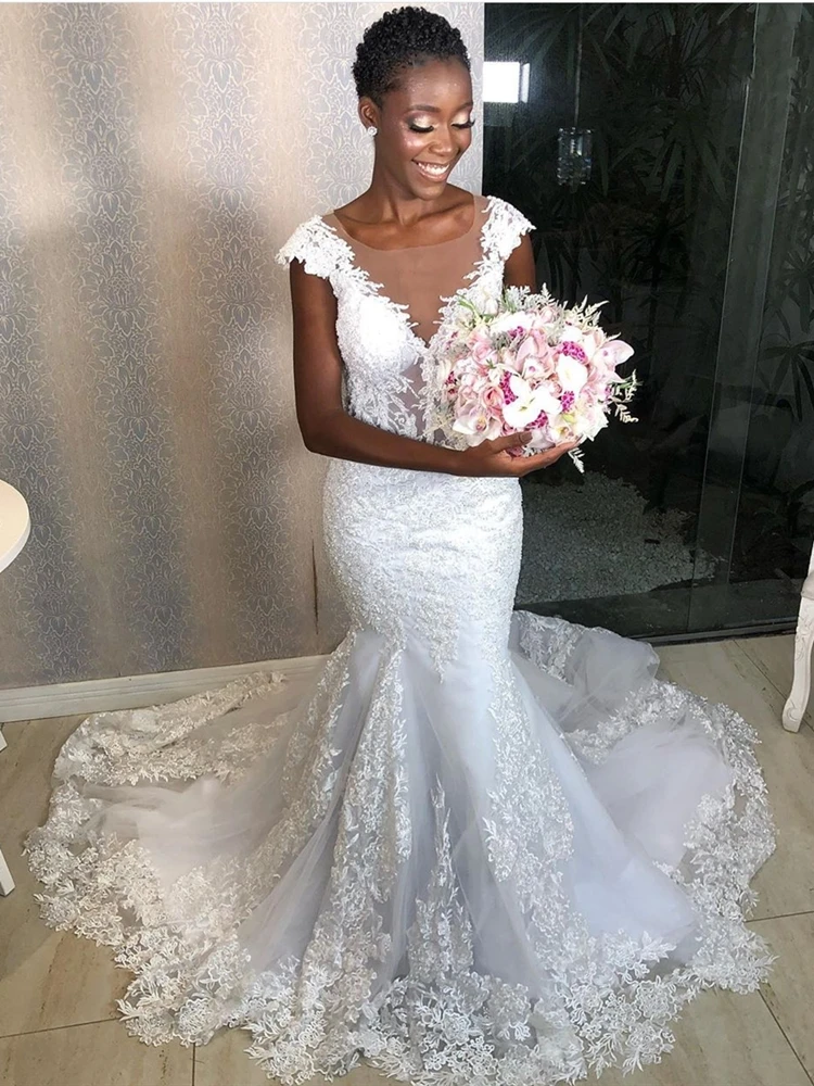 Mermaid Wedding Dresses Sheer Neck Flower Pattern Appliques Lace Cap Sleeve Long Trail Bridal Gowns Luxury vestidos de noiva
Mermaid Wedding Dresses Sheer Neck Flower Pattern Appliques Lace Cap Sleeve Long Trail Bridal Gowns Luxury vestidos de noiva