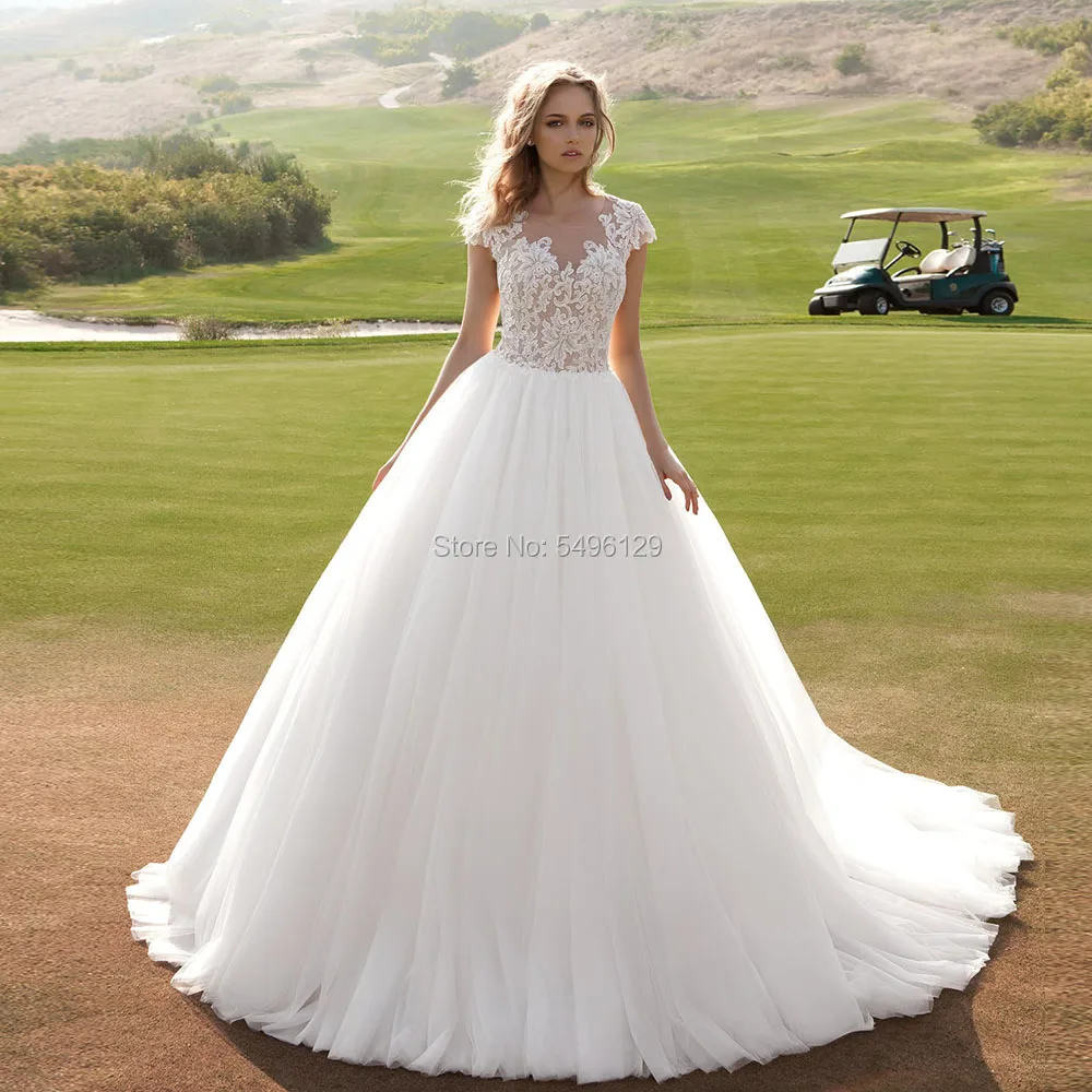 Romantic Lace Appliques Tulle Wedding Dresses 2020 Ivory Vestido De Noiva O-neck Cap Sleeve Sheer Button Back Bridal Gowns Long
Romantic Lace Appliques Tulle Wedding Dresses 2020 Ivory Vestido De Noiva O-neck Cap Sleeve Sheer Button Back Bridal Gowns Long