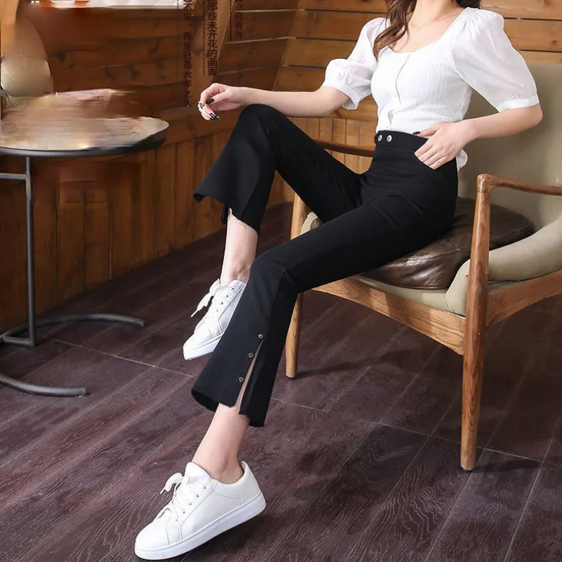 ZHOUTAYLOR Woman Pants Pockets Button fashion Office Lady Flare Trousers Female Elastic Waist Solid Ankle-Length Bottoms Femme 
ZHOUTAYLOR Woman Pants Pockets Button fashion Office Lady Flare Trousers Female Elastic Waist Solid Ankle-Length Bottoms Femme