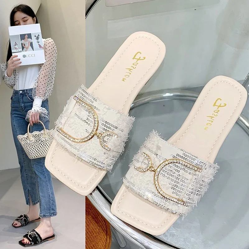 Slippers women's summer fashion outer wear sequins rhinestones flat-heeled flip-flops Korean version of the new soft beach
Slippers women's summer fashion outer wear sequins rhinestones flat-heeled flip-flops Korean version of the new soft beach