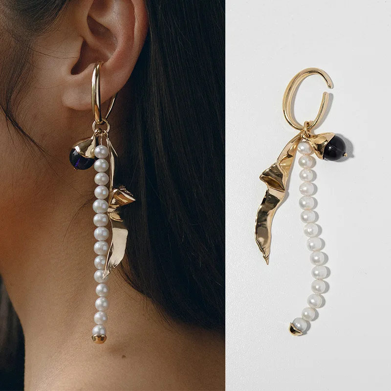 Pearl clip female earring without pierced ears long tassel summer high sense compound earbone clip.
Pearl clip female earring without pierced ears long tassel summer high sense compound earbone clip.