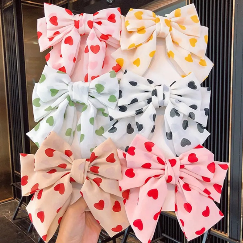 New Trendy Chiffon double love bow hairpin sweet and fresh back head spring clip top clip hair carson hair accessories Girls 
New Trendy Chiffon double love bow hairpin sweet and fresh back head spring clip top clip hair carson hair accessories Girls