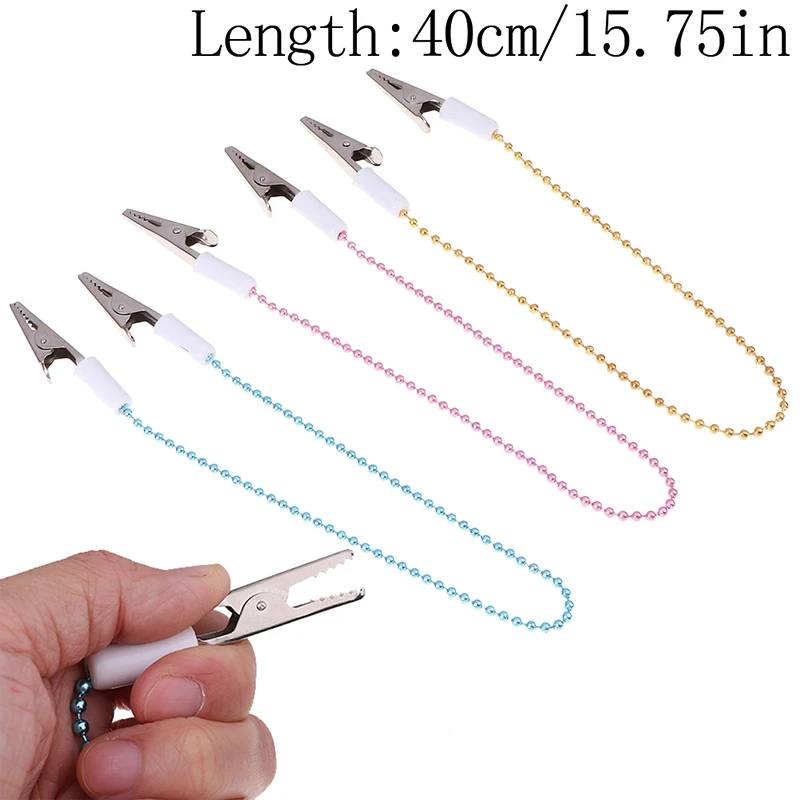 1PCS Disposable Dental Scarf Clip Scarves Aprons Pad Bib Clip Beads Clip Iron/Stainless Steel For Lab Supplies 
1PCS Disposable Dental Scarf Clip Scarves Aprons Pad Bib Clip Beads Clip Iron/Stainless Steel For Lab Supplies