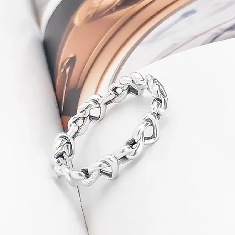 100% 925 Sterling Silver Pan Ring Silver Heart Interwoven Pan Ring For Women Wedding Party Gift Fashion Jewelry 
100% 925 Sterling Silver Pan Ring Silver Heart Interwoven Pan Ring For Women Wedding Party Gift Fashion Jewelry