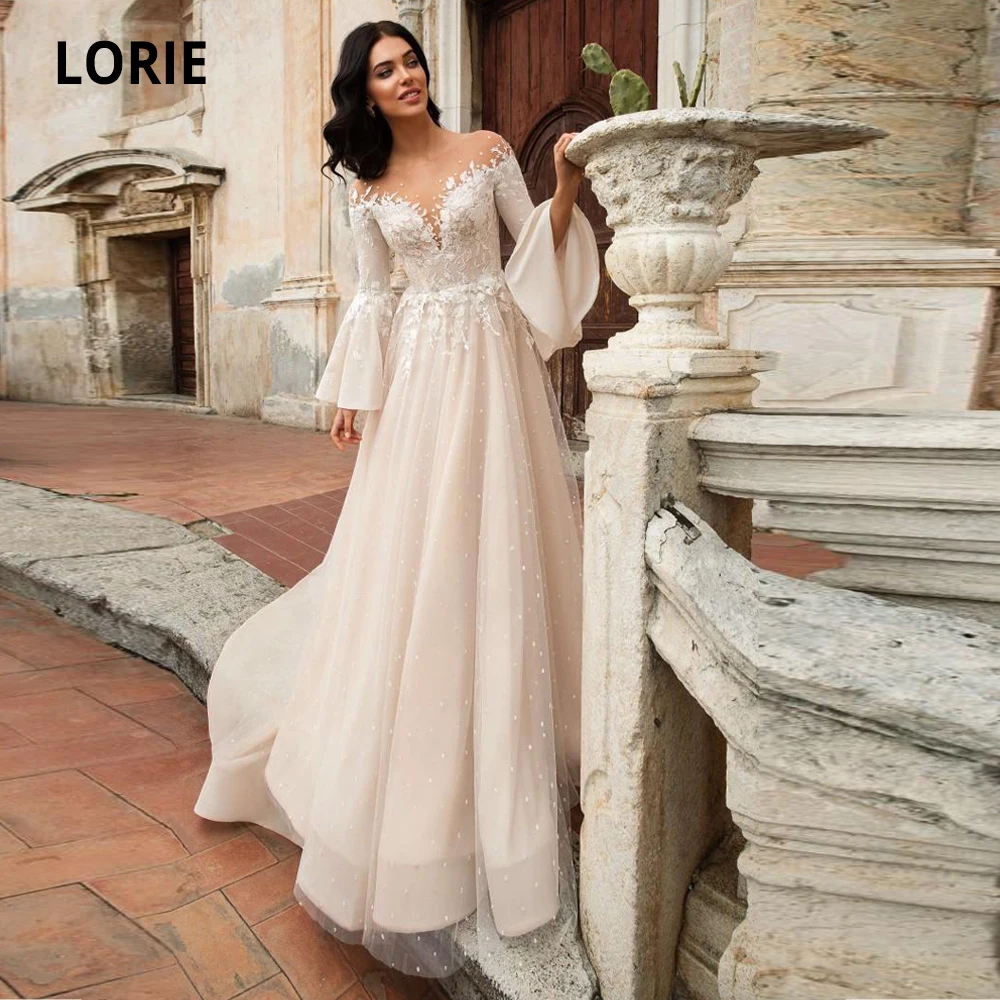 LORIE Blush Pink Wedding Dresses Boho Lace Long Flare Sleeve Appliqued Lace Beach Bridal Gowns Plus Size 2020 Open Back Gown
LORIE Blush Pink Wedding Dresses Boho Lace Long Flare Sleeve Appliqued Lace Beach Bridal Gowns Plus Size 2020 Open Back Gown
