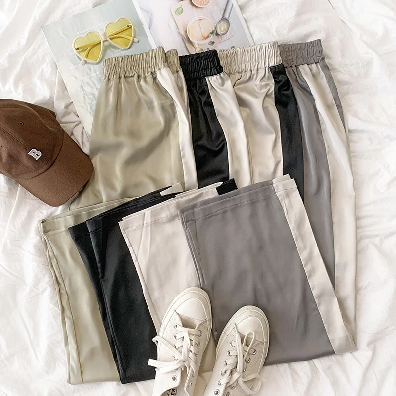 Rena color stitched straight leg pants with reflective feeling, elastic high waist, loose and thin, comfortable and versatile
Rena color stitched straight leg pants with reflective feeling, elastic high waist, loose and thin, comfortable and versatile