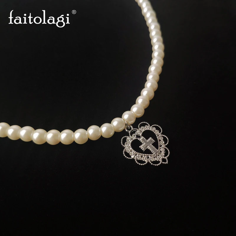 Punk Gothic Pearl Necklace with Hollow Heart Pendant Vintage Cross Choker Necklace for Women Girls Trendy Ladies Jewelry Gift
Punk Gothic Pearl Necklace with Hollow Heart Pendant Vintage Cross Choker Necklace for Women Girls Trendy Ladies Jewelry Gift