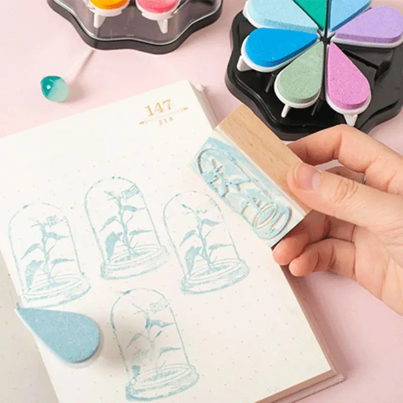 

Cute 8 Colors Water Drop Petal Ink Pad Stamp DIY Finger Painting Craft Kids Student Stationeries