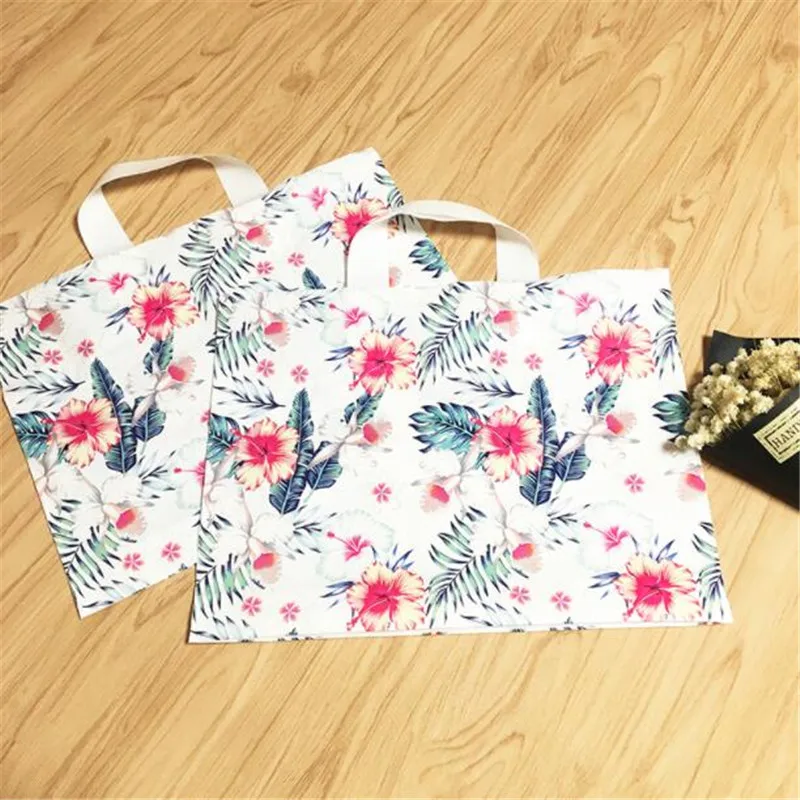 50Pcs/Lot Plastic Gift Bags With Handles Packing Bag For Wedding Party Supplies Baking Package Bags Shops Flowers Birthday Pouch
50Pcs/Lot Plastic Gift Bags With Handles Packing Bag For Wedding Party Supplies Baking Package Bags Shops Flowers Birthday Pouch