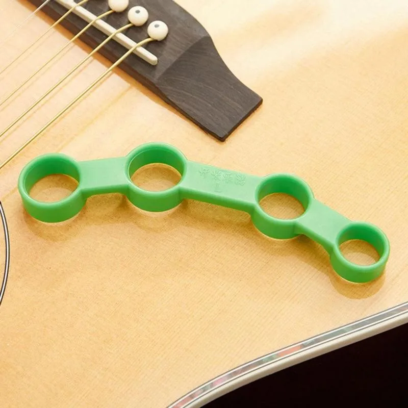 Guitar Expand Finger Training Device Hand Finger Tension Grip Power Trainer Ukulele Piano Bass Musical Instrument Accessories
Guitar Expand Finger Training Device Hand Finger Tension Grip Power Trainer Ukulele Piano Bass Musical Instrument Accessories