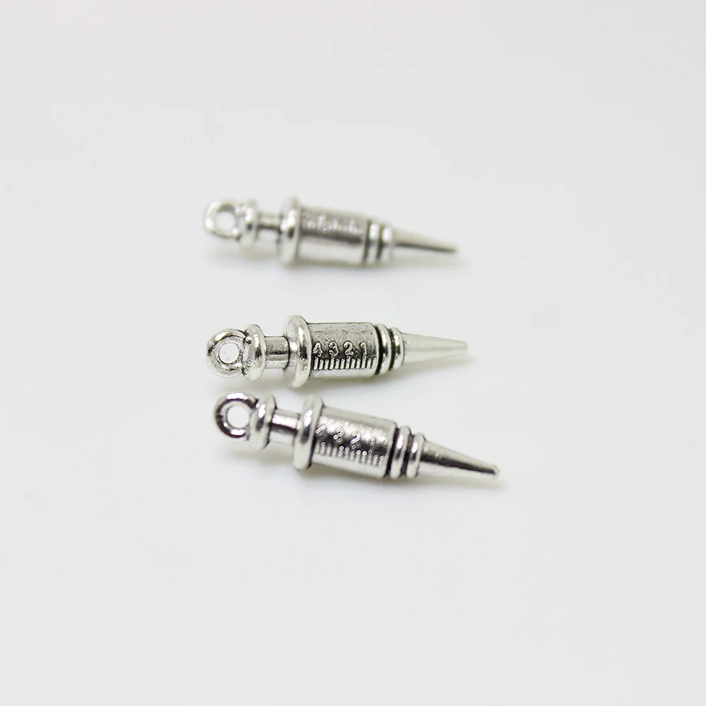 10pcs Silver Color 6x24mm 3D Syringe Nursing Dangle Charms Doctor Medicine Pendant Fit DIY Jewelry Making Handmade Accessories
10pcs Silver Color 6x24mm 3D Syringe Nursing Dangle Charms Doctor Medicine Pendant Fit DIY Jewelry Making Handmade Accessories