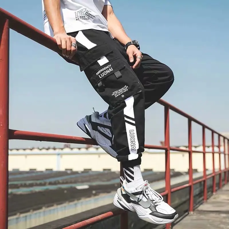 Hip Hop Ribbons Cargo Pants Men Joggers Pants Mens Streetwear Military Pants 2020 Fashion Male Elastic Waist Pant Cotton Black
Hip Hop Ribbons Cargo Pants Men Joggers Pants Mens Streetwear Military Pants 2020 Fashion Male Elastic Waist Pant Cotton Black