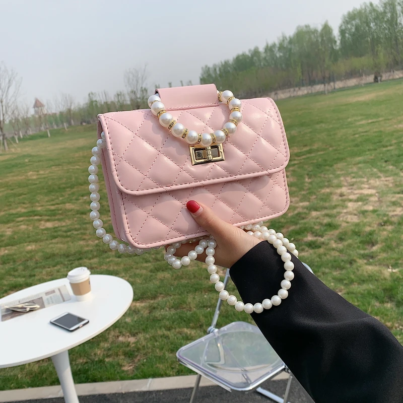 Pearl Belt Mini PU Leather Crossbody Bags for Women 2021 Luxury Branded Shoulder Bag Summer Travel Ladies Purses and Handbags 
Pearl Belt Mini PU Leather Crossbody Bags for Women 2021 Luxury Branded Shoulder Bag Summer Travel Ladies Purses and Handbags