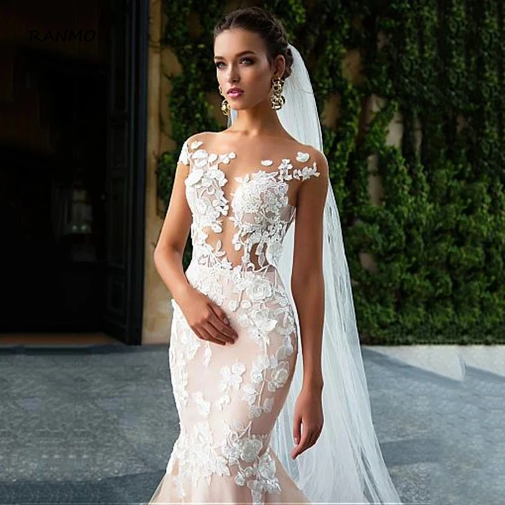 RANMO Luxury Mermaid Wedding Dresses 2021 Open Back Short Sleeves Wedding Gowns Lace Appliques Robe De Mariage Bride Gowns 
RANMO Luxury Mermaid Wedding Dresses 2021 Open Back Short Sleeves Wedding Gowns Lace Appliques Robe De Mariage Bride Gowns