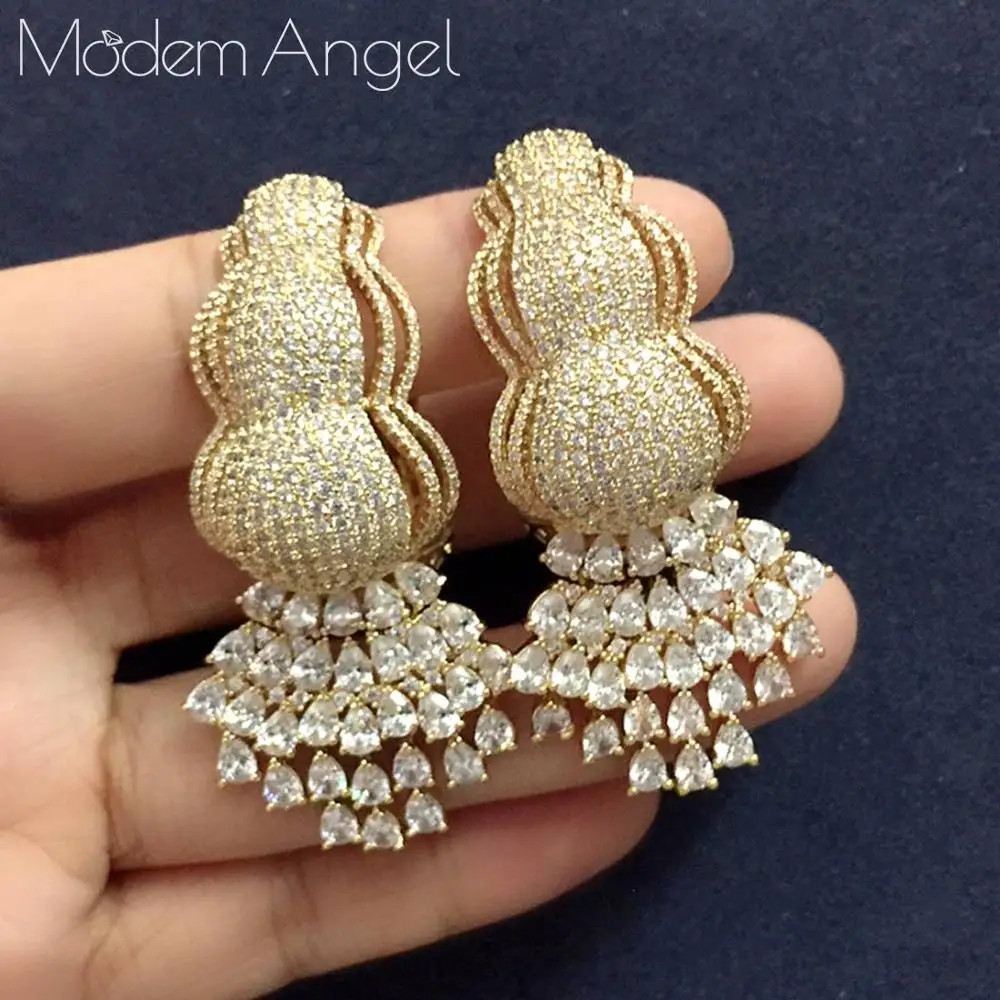 ModemAngel new arrived New flower shape Hoop Earrings for Women gift for Women Party Luxury Dubai Nigeria CZ Crystal Wedding Je
ModemAngel new arrived New flower shape Hoop Earrings for Women gift for Women Party Luxury Dubai Nigeria CZ Crystal Wedding Je