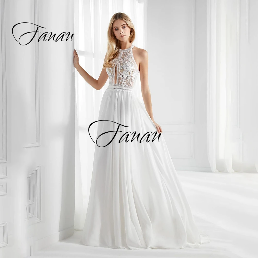 Halter Backless Sleeveless A-Line Wedding Dress Lace Appliques See-Through Tulle IIIusion Bridal Gown robe de soirée de mariage
Halter Backless Sleeveless A-Line Wedding Dress Lace Appliques See-Through Tulle IIIusion Bridal Gown robe de soirée de mariage