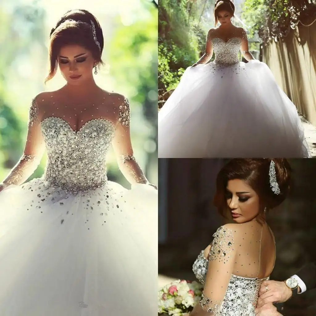 Designer Luxury Crystals Long Sleeves Ball Gowns Wedding Dresses Rhinestones Lace-up Back Arabic Wedding Gown Sheer Neck Vestido
Designer Luxury Crystals Long Sleeves Ball Gowns Wedding Dresses Rhinestones Lace-up Back Arabic Wedding Gown Sheer Neck Vestido