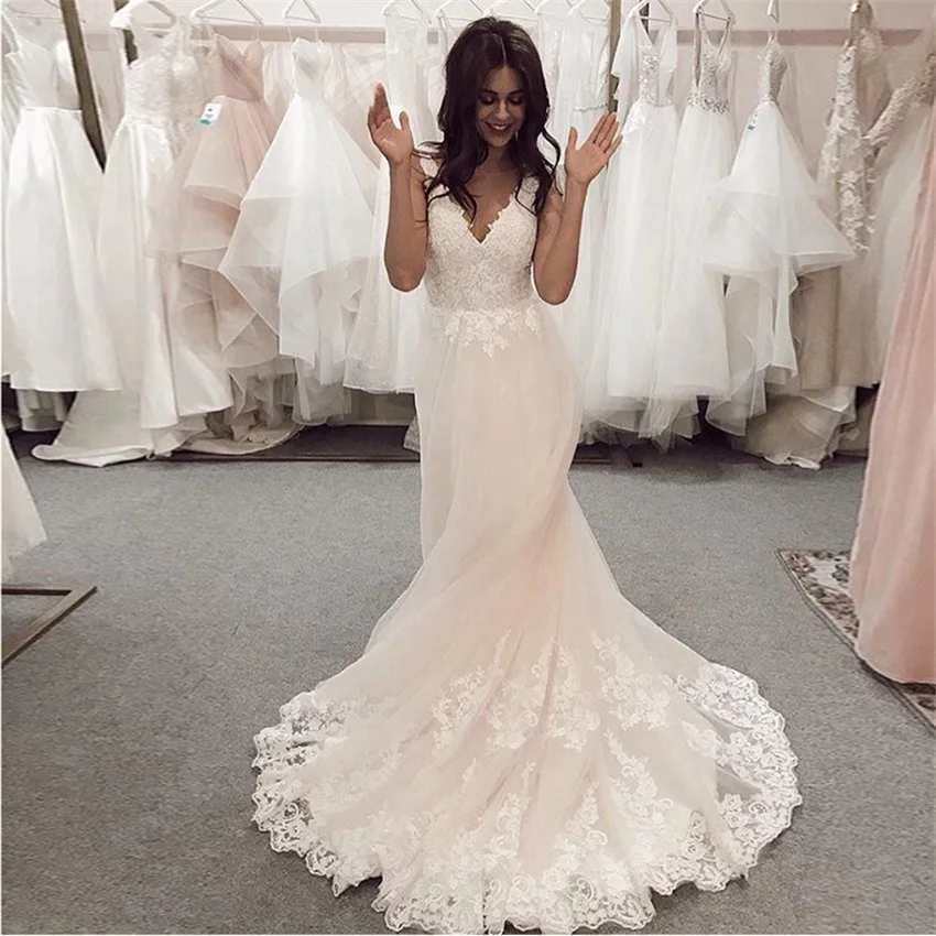 Elegant A-line Wedding Dresses V-neck Sleeveless White Ivory Backless Sweep Train Wedding Gowns Custom Vestido De Novia 2020
Elegant A-line Wedding Dresses V-neck Sleeveless White Ivory Backless Sweep Train Wedding Gowns Custom Vestido De Novia 2020