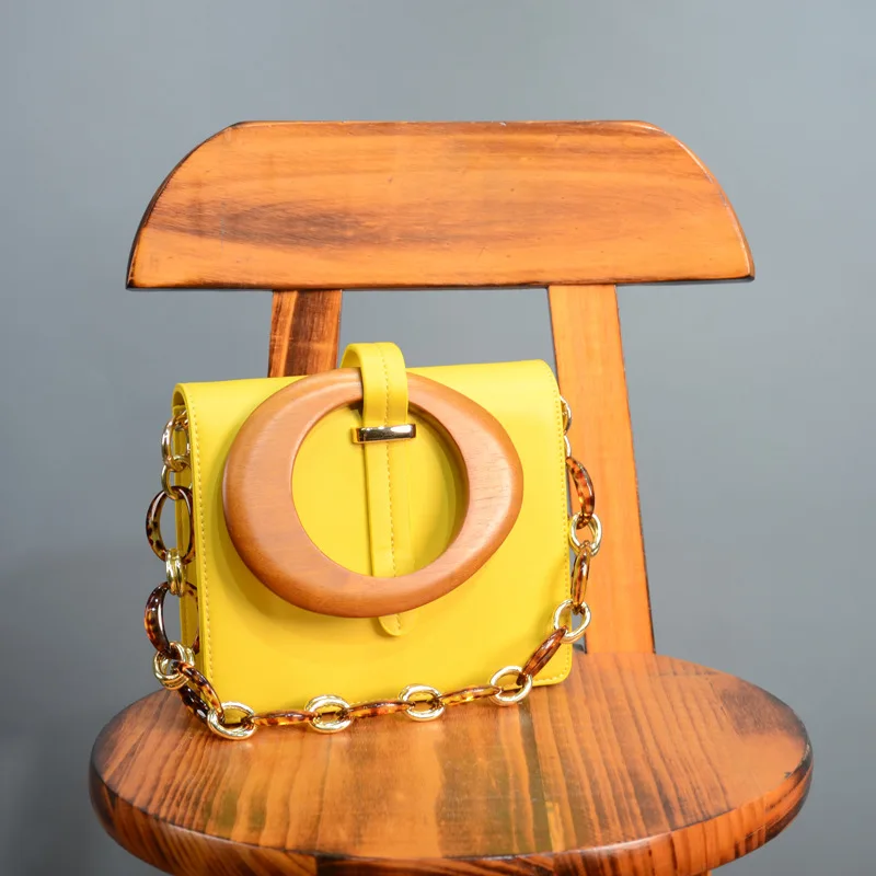 New Designer Wooden Handle Handbags For Women Fashion Acrylic Chain Crossbody Bag Luxury PU Leather Shoulder Bags Ladies Purses
New Designer Wooden Handle Handbags For Women Fashion Acrylic Chain Crossbody Bag Luxury PU Leather Shoulder Bags Ladies Purses