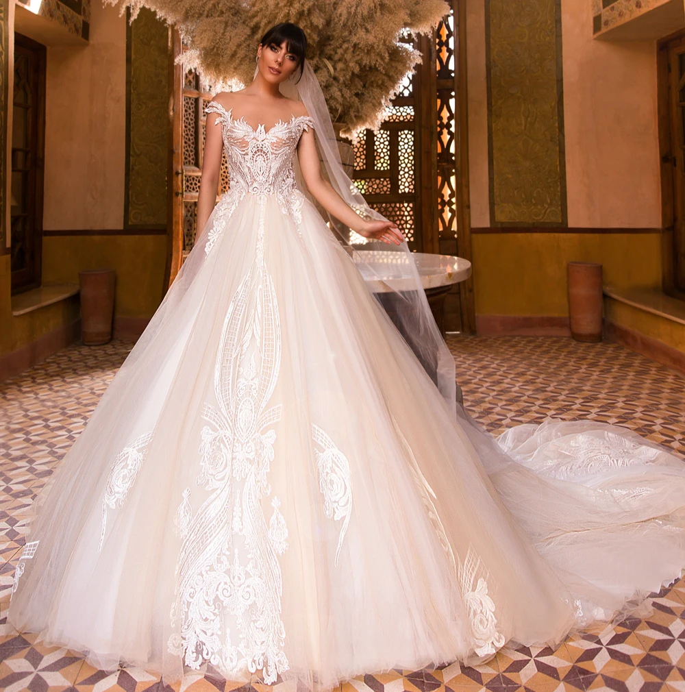 Новый дизайн длинное свадебное платье 2020 suknie slubne Sheer Neck Cap Sleeve Chapel Train Appliques Tulle A-Line для невесты
Новый дизайн длинное свадебное платье 2020 suknie slubne Sheer Neck Cap Sleeve Chapel Train Appliques Tulle A-Line для невесты
