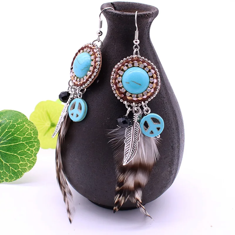 Feather earrings bohemian feather crystal and peace circle handmade earrings for women fashion round rhinestone earrings jewelry
Feather earrings bohemian feather crystal and peace circle handmade earrings for women fashion round rhinestone earrings jewelry
