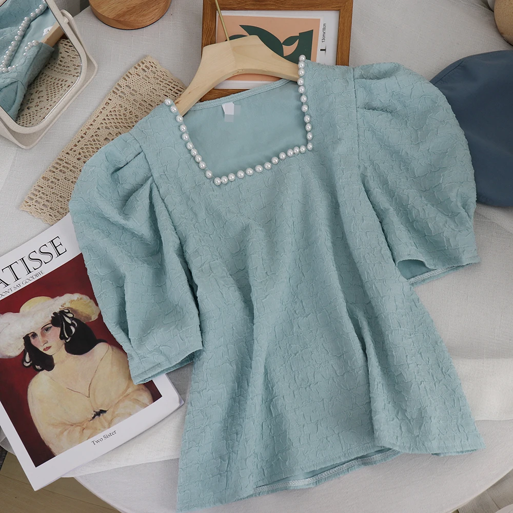 French Square Collar Short Sleeve T-shirt for Women 2021 Summer New Sweet Design Puff Sleeve Tops Simple Temperament Blouse
French Square Collar Short Sleeve T-shirt for Women 2021 Summer New Sweet Design Puff Sleeve Tops Simple Temperament Blouse