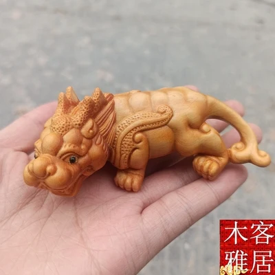 Exquisite cliff cypress Lucky Paixiu handles ornaments wood carving pendants solid wood animal and animal beasts
Exquisite cliff cypress Lucky Paixiu handles ornaments wood carving pendants solid wood animal and animal beasts