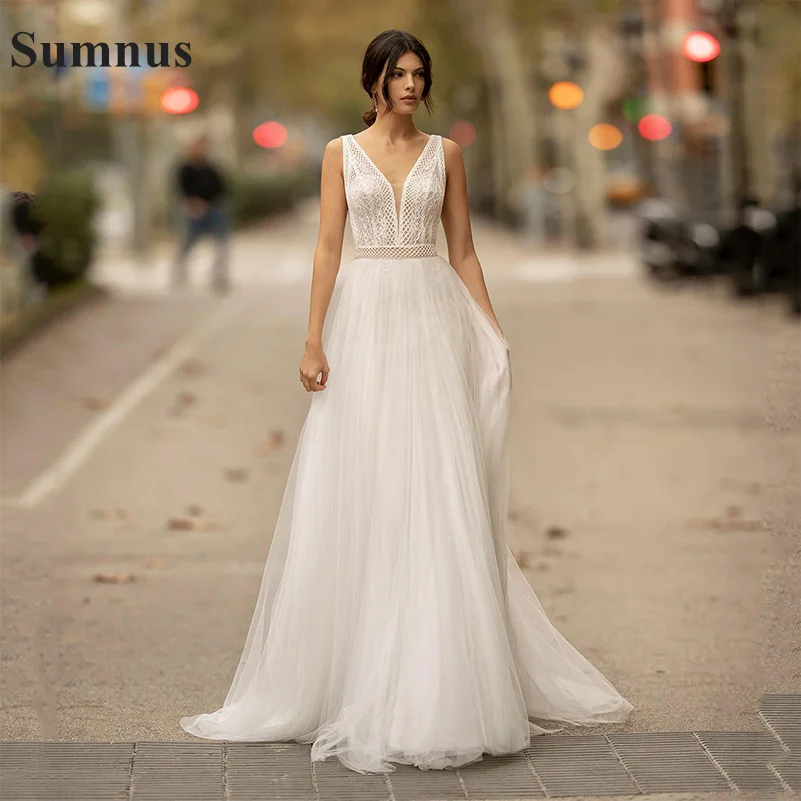 Sumnus Top Lace Tulle Wedding Dresses Sexy Backless A Line Appliqued V Neck Cheap Beach Bridal Dress Wedding Gowns
Sumnus Top Lace Tulle Wedding Dresses Sexy Backless A Line Appliqued V Neck Cheap Beach Bridal Dress Wedding Gowns