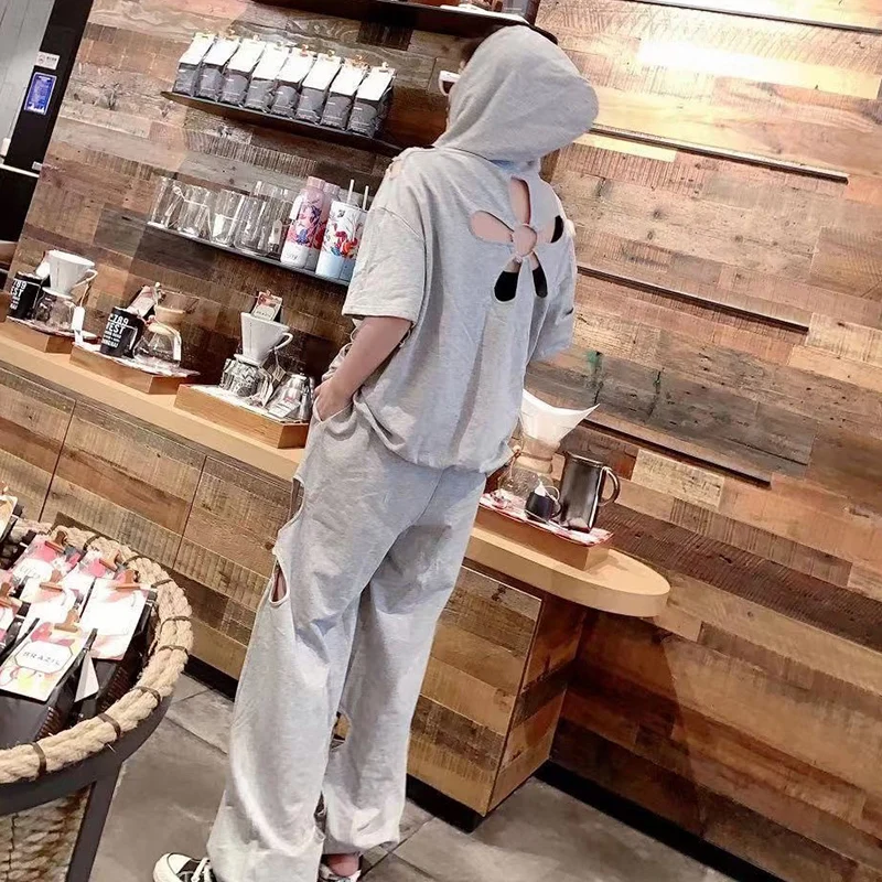 TWOTWINSTYLE Hollow Out Casual Set For Women Hooded Collar Sweatshirt High Waist Sporty Pants Female Two Piece Set 2021
TWOTWINSTYLE Hollow Out Casual Set For Women Hooded Collar Sweatshirt High Waist Sporty Pants Female Two Piece Set 2021