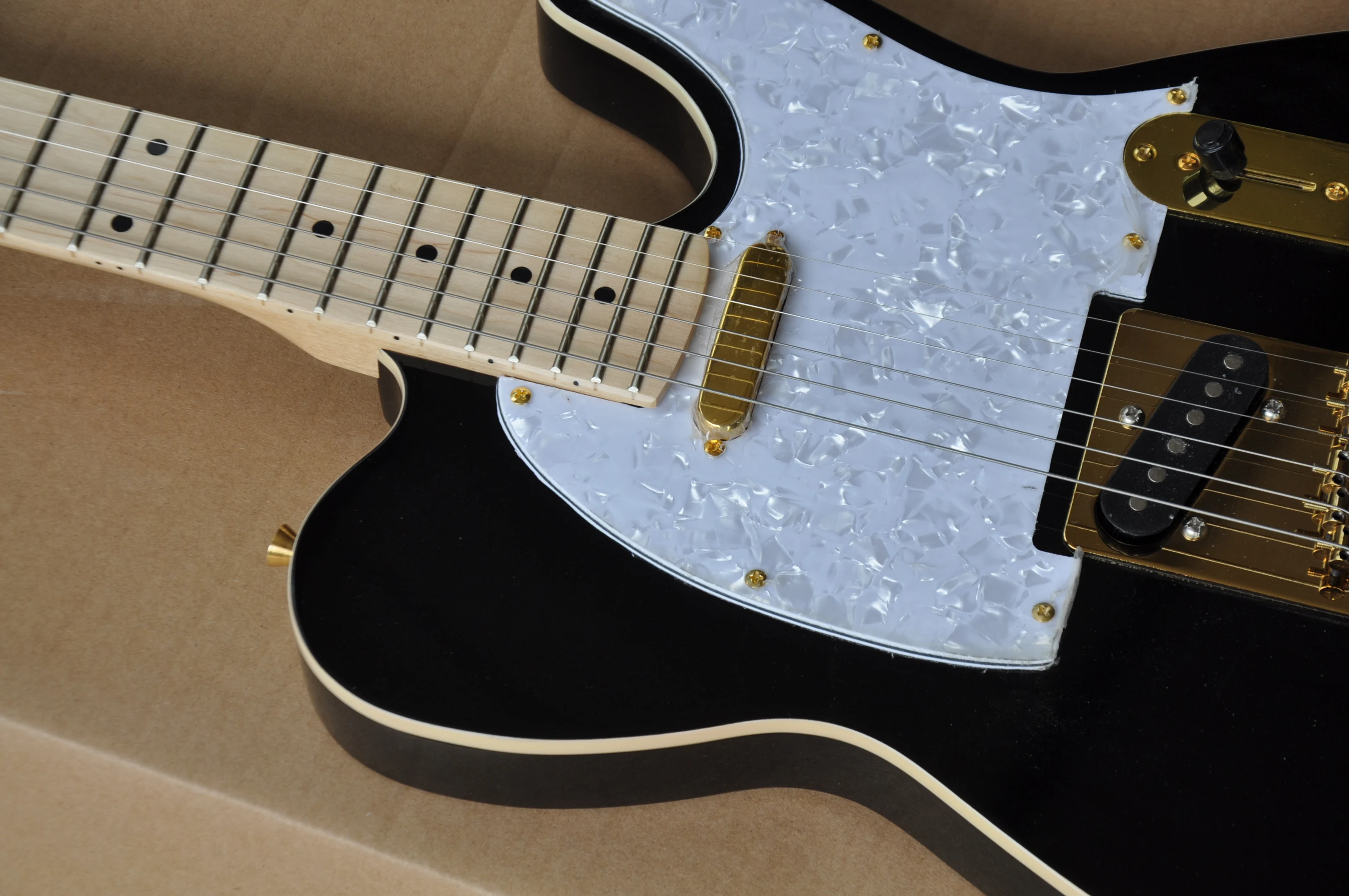 China guitar factory custom new black TL electric guitar Maple fingerboard Golden hardware high quality free shipping 8pai 
China guitar factory custom new black TL electric guitar Maple fingerboard Golden hardware high quality free shipping 8pai