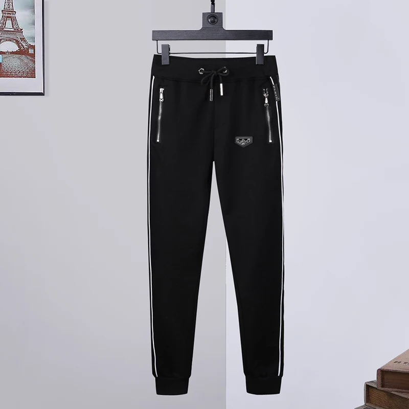 2022 sports pants men's side webbing decoration PP European and American fashion trend spring and autumn slim trousers plein
2022 sports pants men's side webbing decoration PP European and American fashion trend spring and autumn slim trousers plein