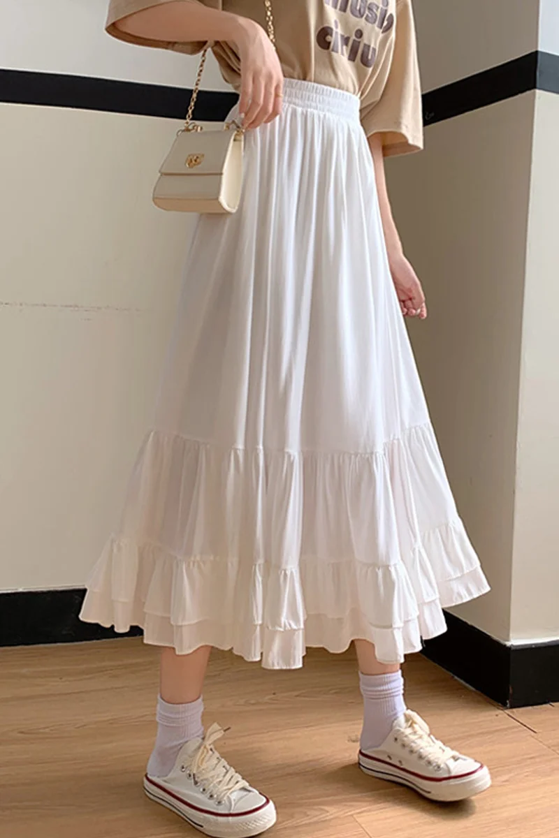 Женская юбка средней длины белая А-силуэта с высокой талией на весну и осень