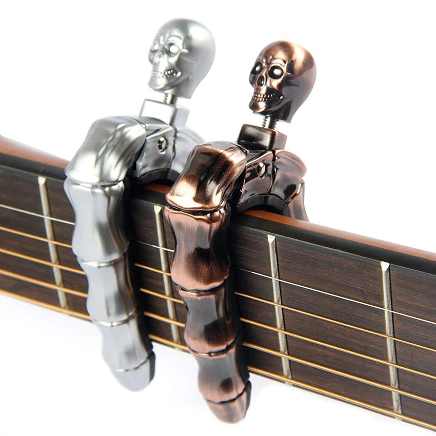 Skull Head Guitar Capo for Guitars, Ukulele, Banjo, Mandolin, Bass, Lightweight Zinc Alloy for 6 & 12 String Instruments
Skull Head Guitar Capo for Guitars, Ukulele, Banjo, Mandolin, Bass, Lightweight Zinc Alloy for 6 & 12 String Instruments
