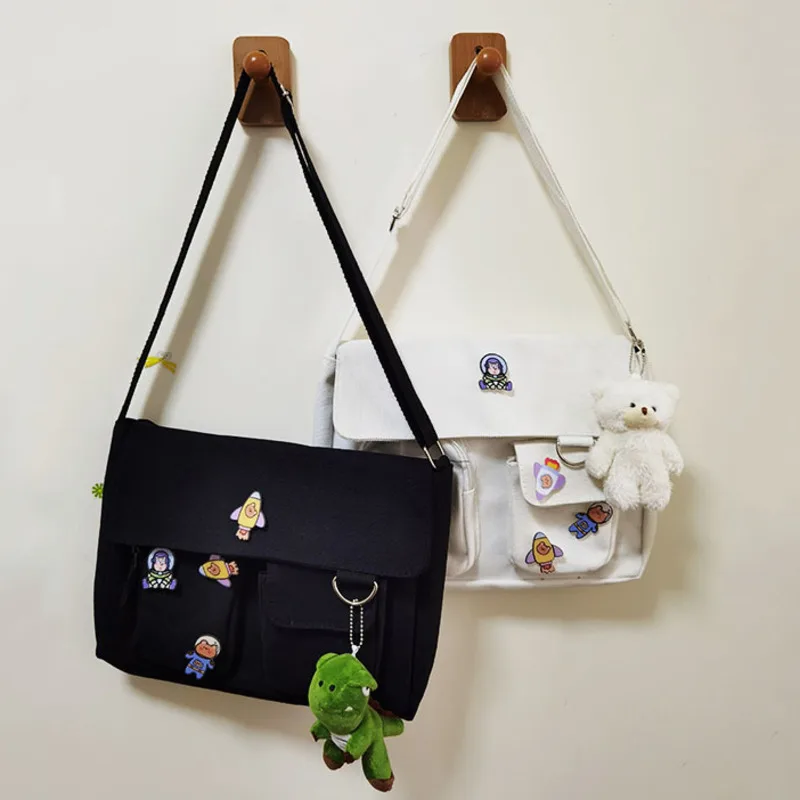 Womens Cartoon Canvas Bag Art Student Canvas Bag One Shoulder Messenger Bag Creative Pendant Bookbag Female Office Bag
Womens Cartoon Canvas Bag Art Student Canvas Bag One Shoulder Messenger Bag Creative Pendant Bookbag Female Office Bag