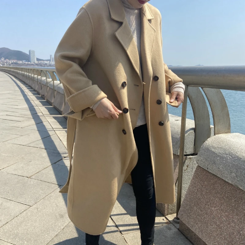 Женское шерстяное пальто ручной работы, длинное двубортное пальто из 2021 размера плюс шерсти, с поясом на шнуровке, в Корейском стиле, зима 100%
Женское шерстяное пальто ручной работы, длинное двубортное пальто из 2021 размера плюс шерсти, с поясом на шнуровке, в Корейском стиле, зима 100%