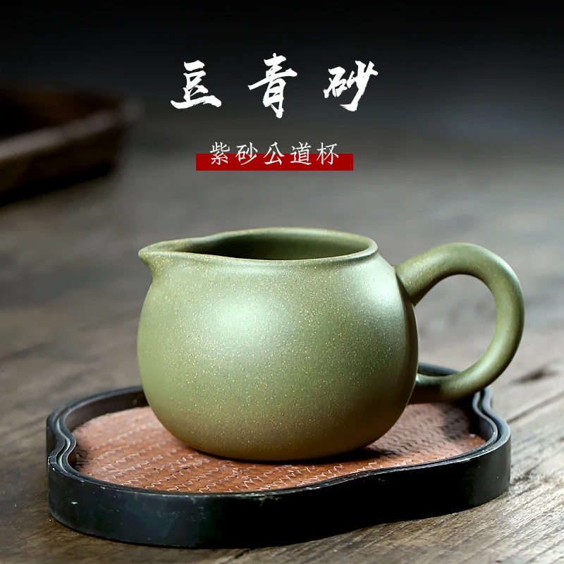TaoYuan 】 yixing all hand purple sand tea fair undressed ore violet arenaceous pea green sand cup 250 cc
TaoYuan 】 yixing all hand purple sand tea fair undressed ore violet arenaceous pea green sand cup 250 cc
